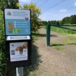 Photograph of free poo bag dispenser at the entrance.